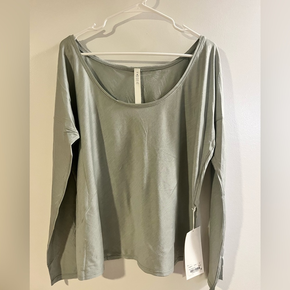 Never worn LuLuLemon Heart Open Long Sleeve. Size 10